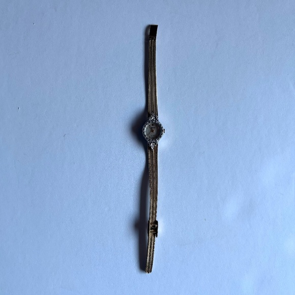 Authentic vintage Gruen women's luxury gold and diamond bezel quartz watch - Picture 9 of 10